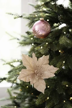 Blomst på klype gull