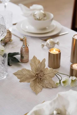 Blomst på klype gull