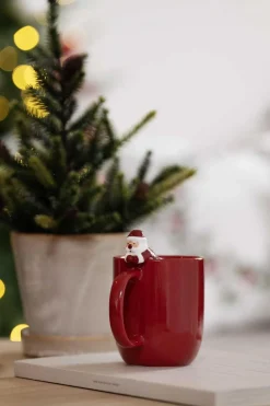 Kopp med nisse på kanten